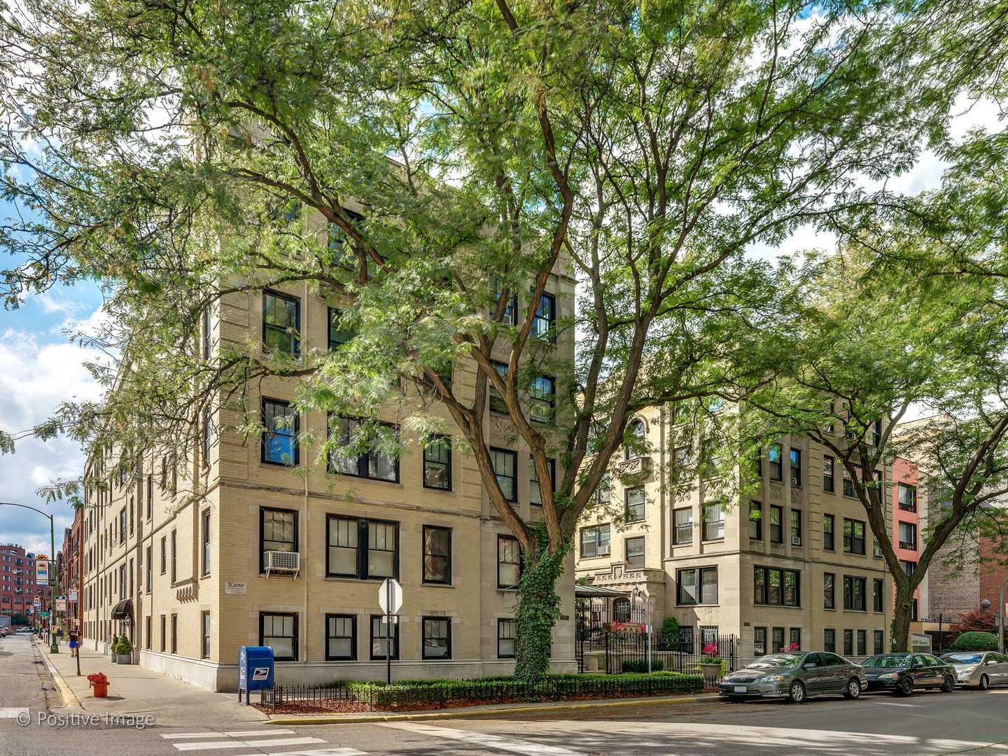 a view of a building and a street