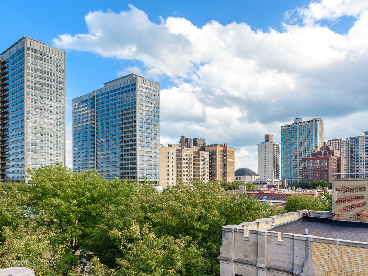 3608 North Pine Grove Avenue, Unit 1M Chicago, IL 60613 - Photo 24 of 24 a view of a city with tall buildings