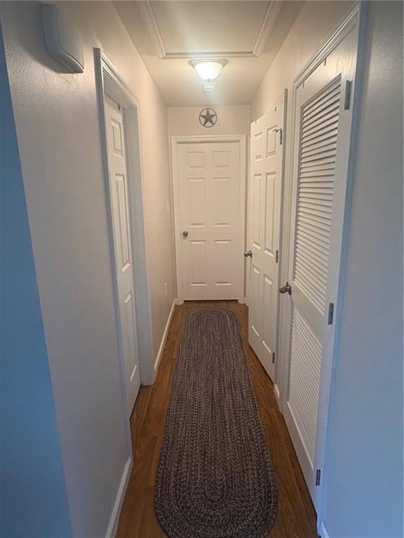 382 Hosack Road Jackson Center, PA 16133 - Photo 11 of 27 a view of a hallway with wooden floor and closet area