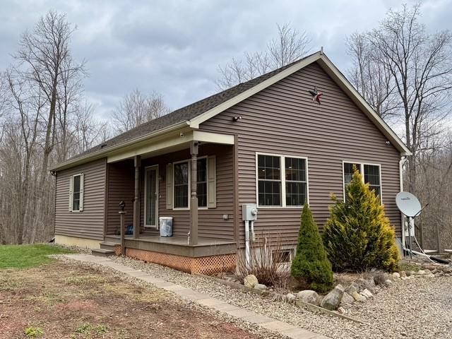 382 Hosack Road Jackson Center, PA 16133 - Photo 3 of 27 a front view of a house with garden