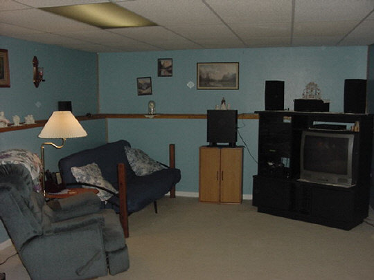 2773 Graham Road Belvidere, IL 61008 - Photo 4 of 6 a living room with furniture and a flat screen tv