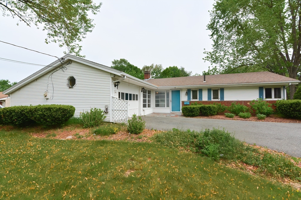 12 Catherine Road Framingham, MA 01701 - Photo 5 of 40 a house view with a garden space