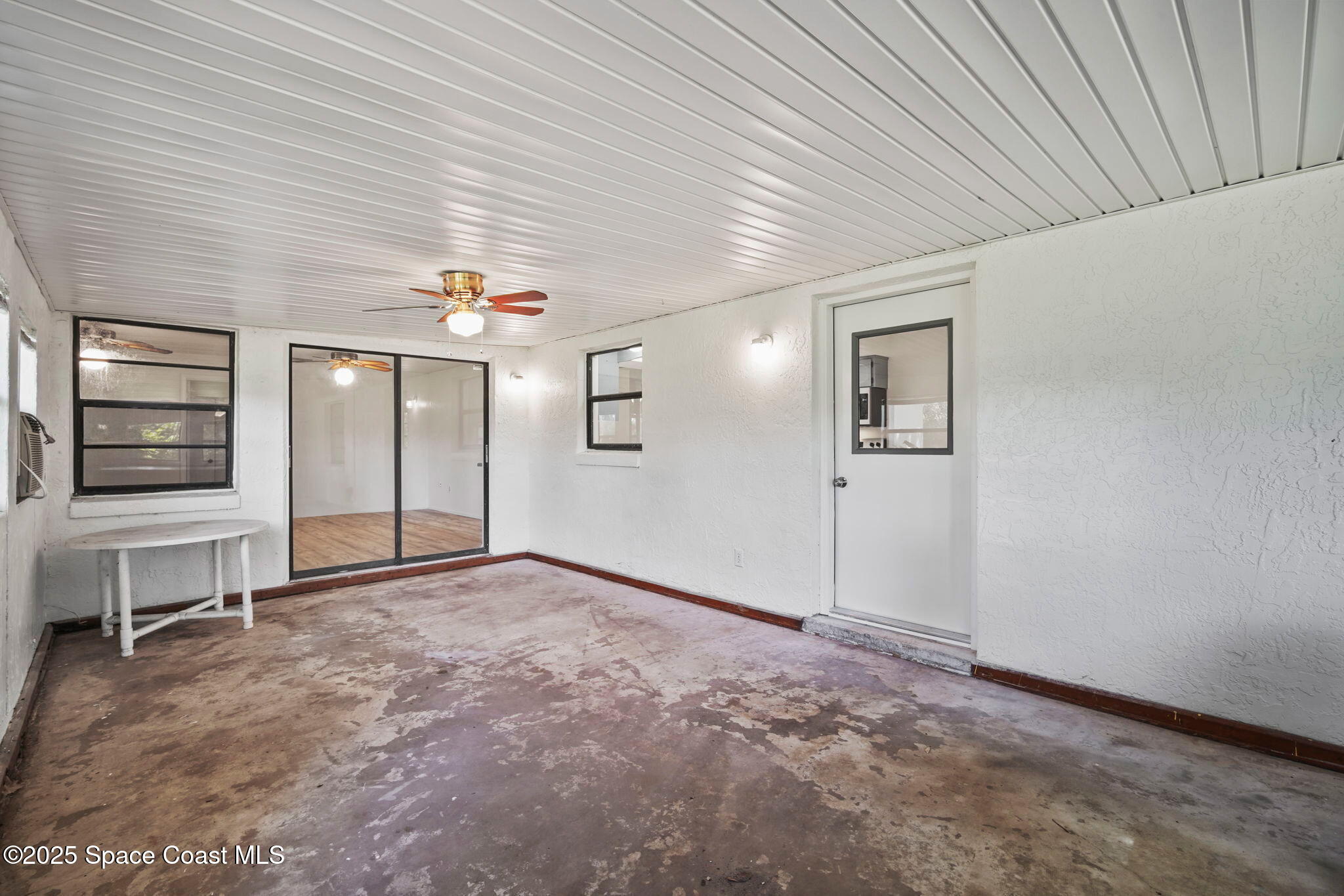 3125 Lionel Road Mims, FL 32754 - Photo 24 of 31 an empty room with windows