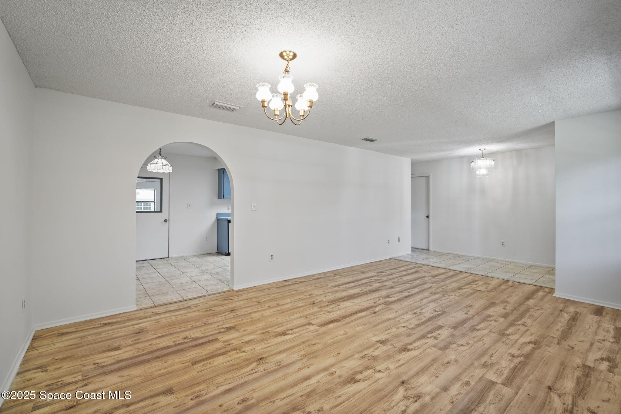 3125 Lionel Road Mims, FL 32754 - Photo 5 of 31 a view of empty room with a fireplace