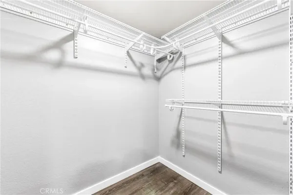 a view of a room with racks on the wall