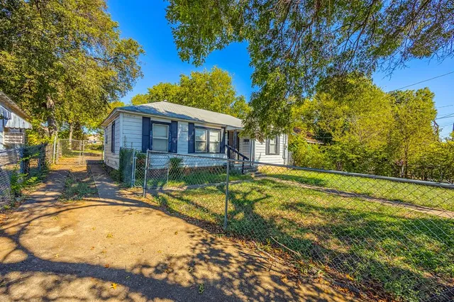 a view of a house with swimming pool