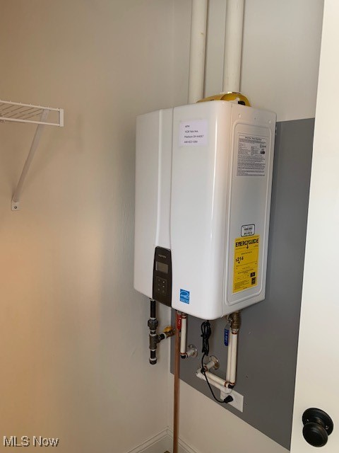 1775 Green Road Madison, OH 44057 - Photo 42 of 46 on demand water heater located in the laundry room closet