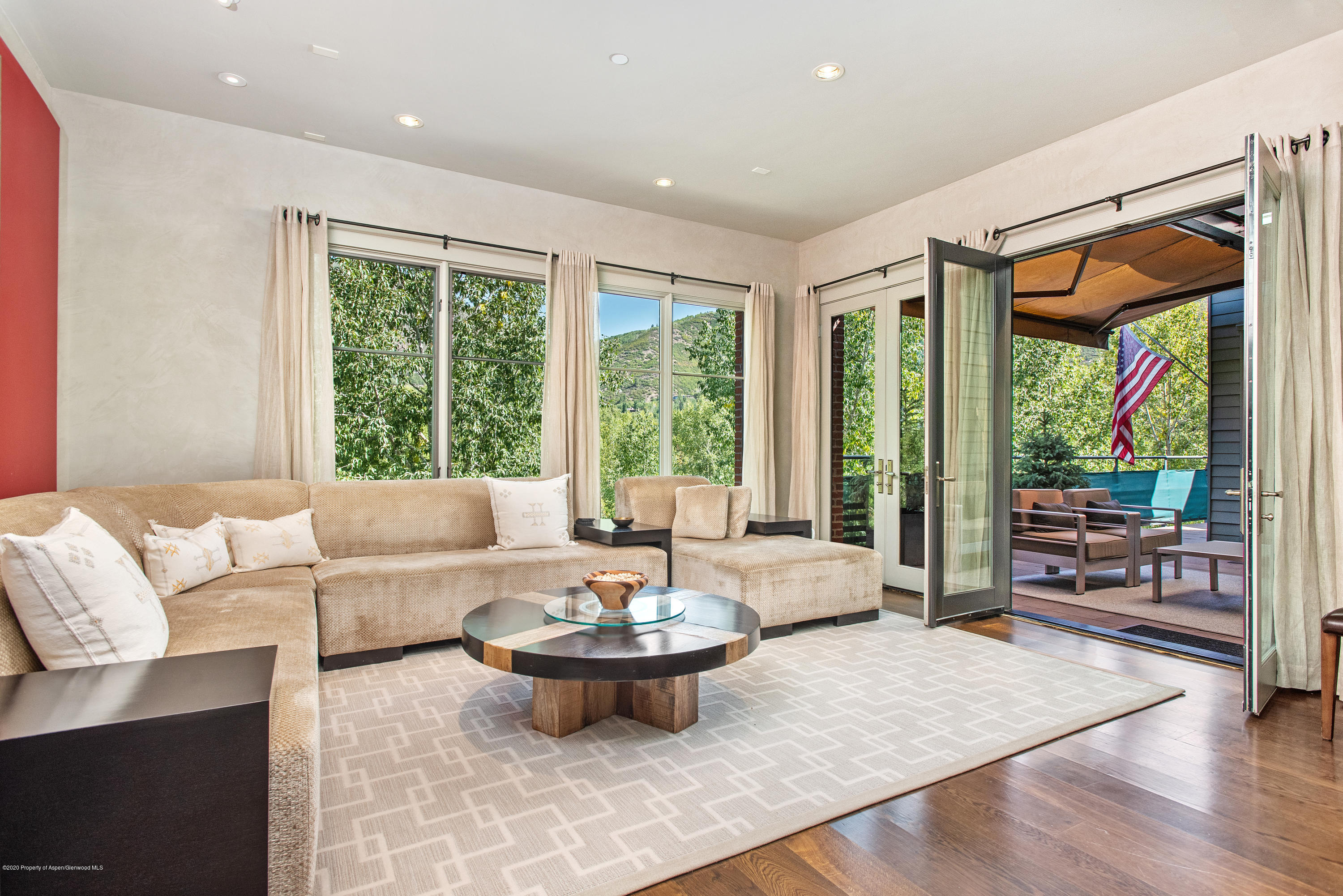 501 Rio Grande Place, Unit 205 Aspen, CO 81611 - Photo 3 of 17 a living room with furniture and a large window