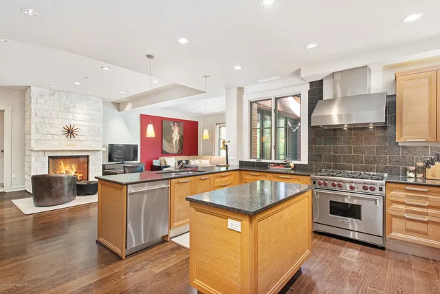 a kitchen with a stove and a sink