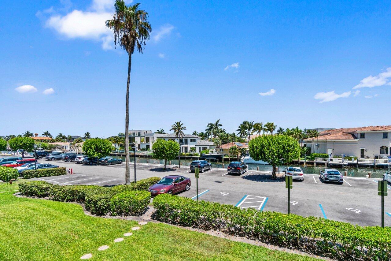 899 Jeffery Street, Unit 2120 Boca Raton, FL 33487 - Photo 27 of 38 a park with lots of swings and slides