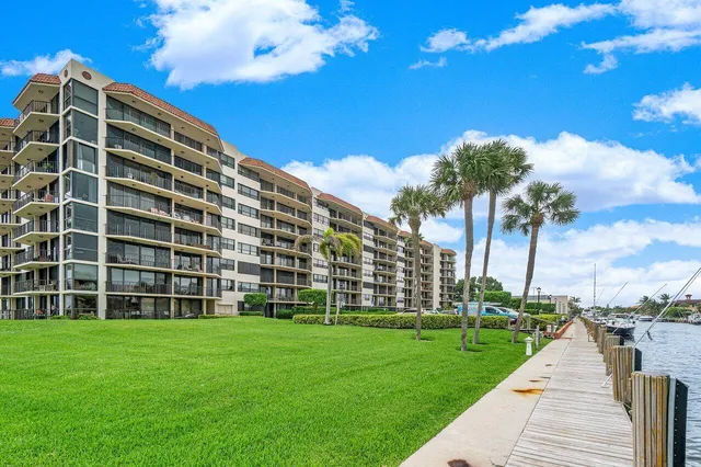 a view of a building with a yard
