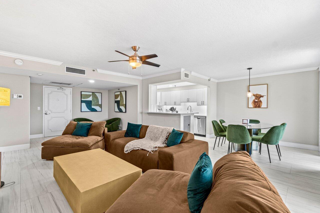 899 Jeffery Street, Unit 2120 Boca Raton, FL 33487 - Photo 7 of 38 a living room with furniture and wooden floor