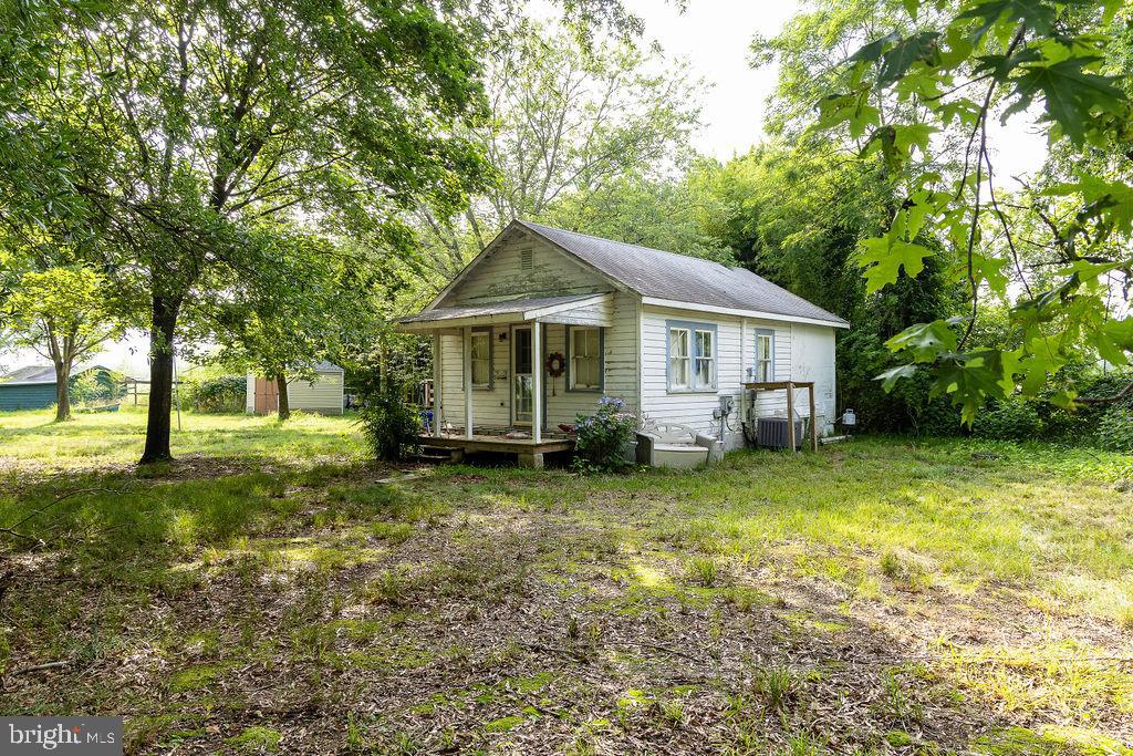 6225 Sandy Point Road Prince Frederick, MD 20678 - Photo 17 of 45 a view of a house with a backyard