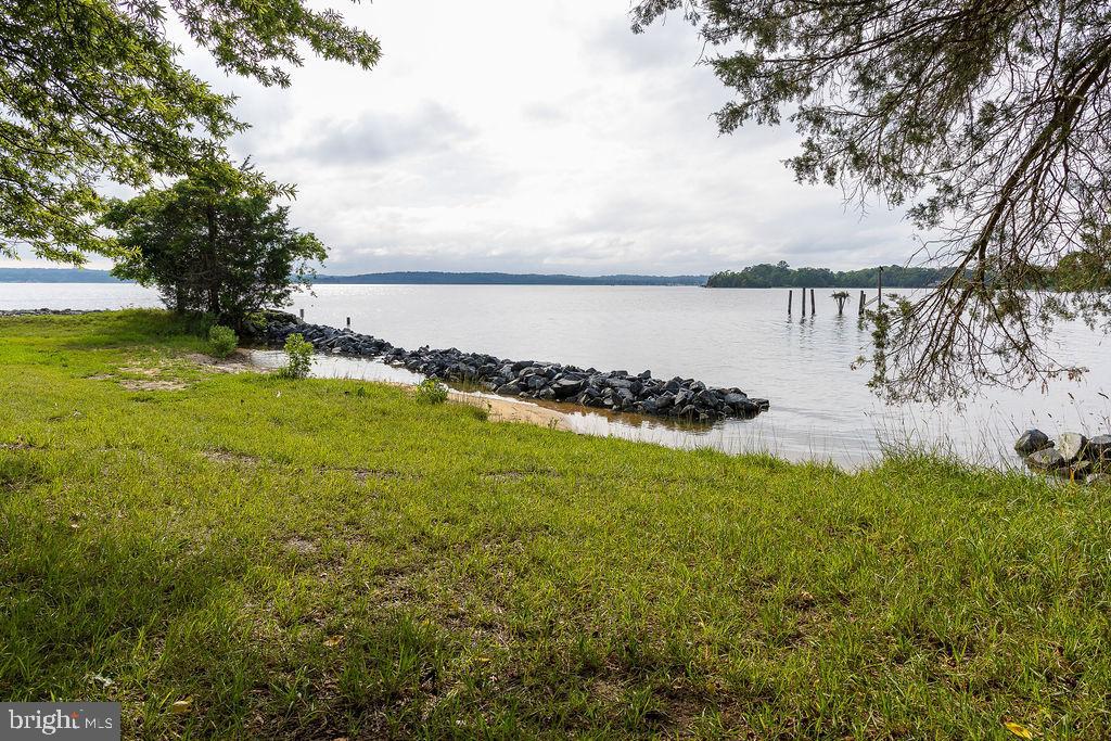 6225 Sandy Point Road Prince Frederick, MD 20678 - Photo 21 of 45 a view of a lake with a big yard