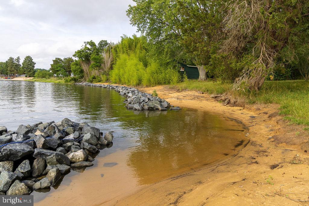 6225 Sandy Point Road Prince Frederick, MD 20678 - Photo 22 of 45 a view of a lake with houses