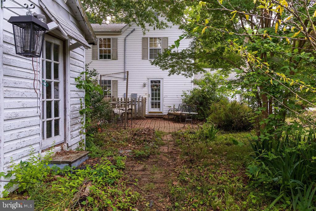 6225 Sandy Point Road Prince Frederick, MD 20678 - Photo 35 of 45 a view of backyard of house with green space