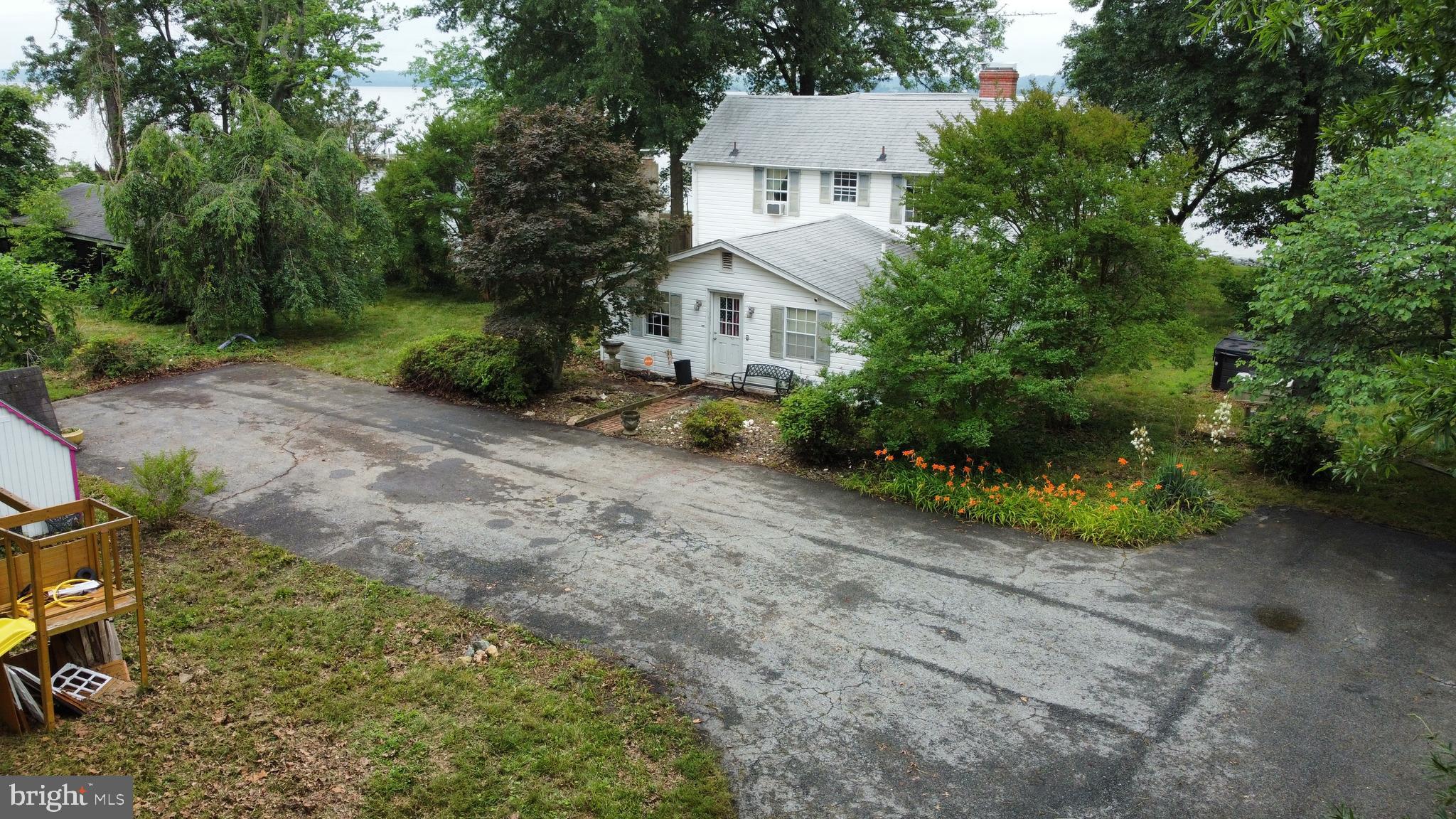 6225 Sandy Point Road Prince Frederick, MD 20678 - Photo 6 of 45 a view of a back yard of the house