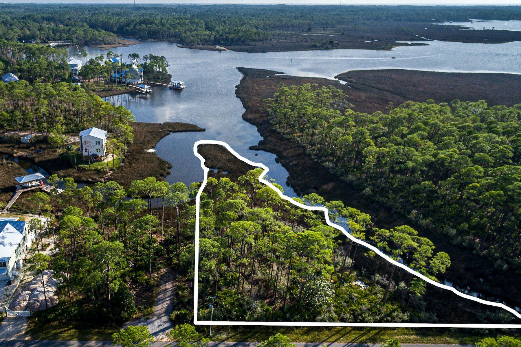 Lot 15 West Nursery Road Santa Rosa Beach, FL 32459 - Photo 40 of 45 an aerial view of a house with a yard and lake view