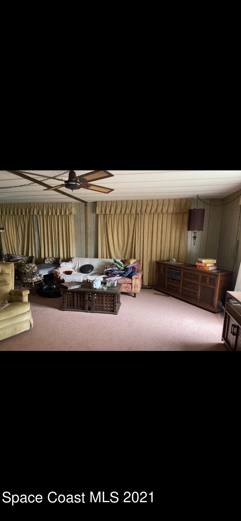 3370 Turnbull Road Mims, FL 32754 - Photo 8 of 13 a living room with furniture