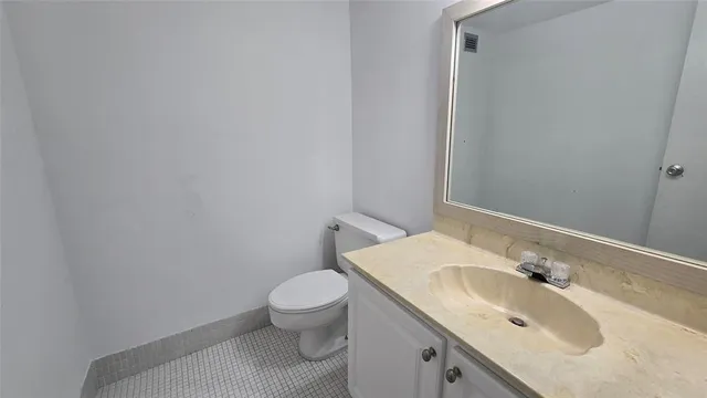 a bathroom with a sink and a toilet