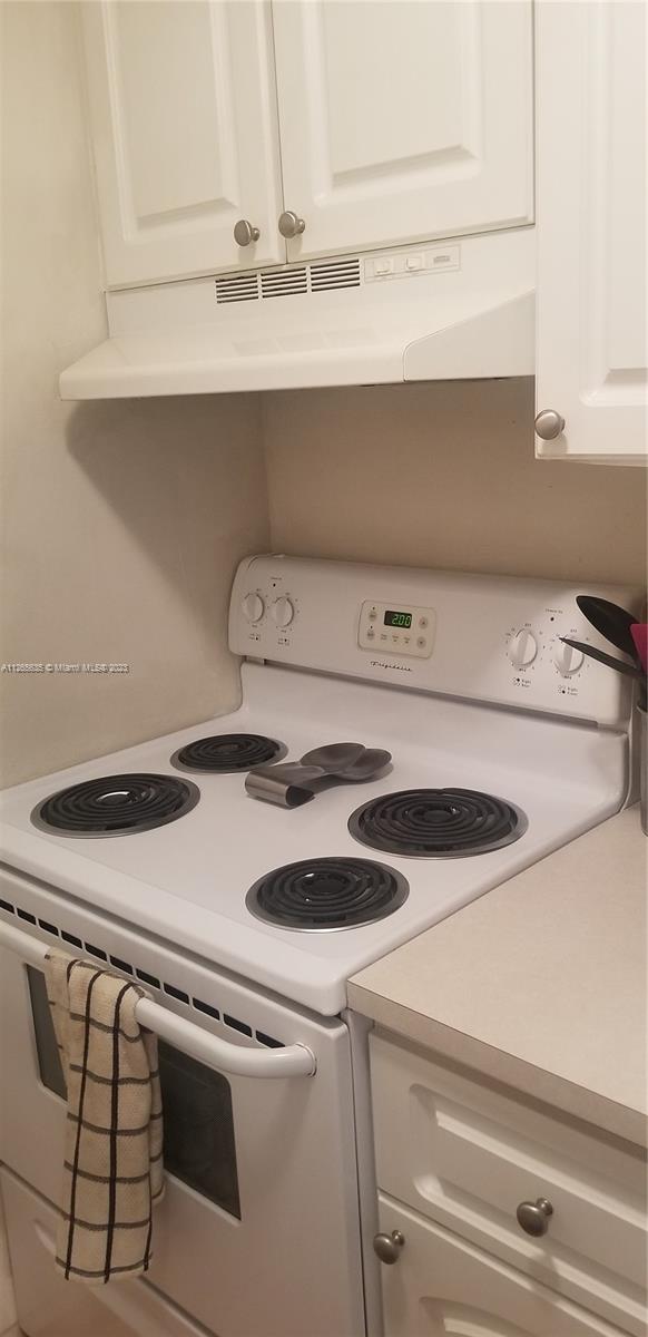 2920 Southwest 28th Terrace, Unit 304 Miami, FL 33133 - Photo 11 of 26 a close view of washer and dryer