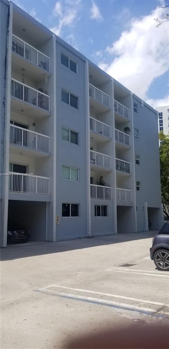 2920 Southwest 28th Terrace, Unit 304 Miami, FL 33133 - Photo 16 of 26 a view of a building with windows