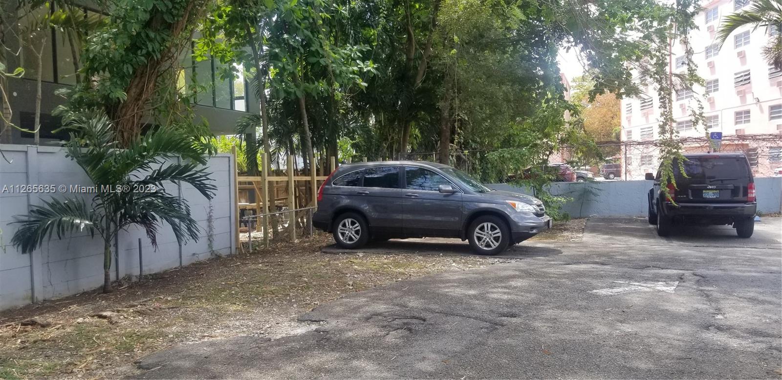 2920 Southwest 28th Terrace, Unit 304 Miami, FL 33133 - Photo 19 of 26 a view of a car in front of a house
