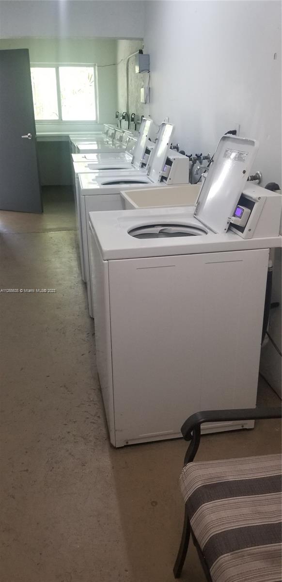 2920 Southwest 28th Terrace, Unit 304 Miami, FL 33133 - Photo 25 of 26 a utility room with dryer and washer