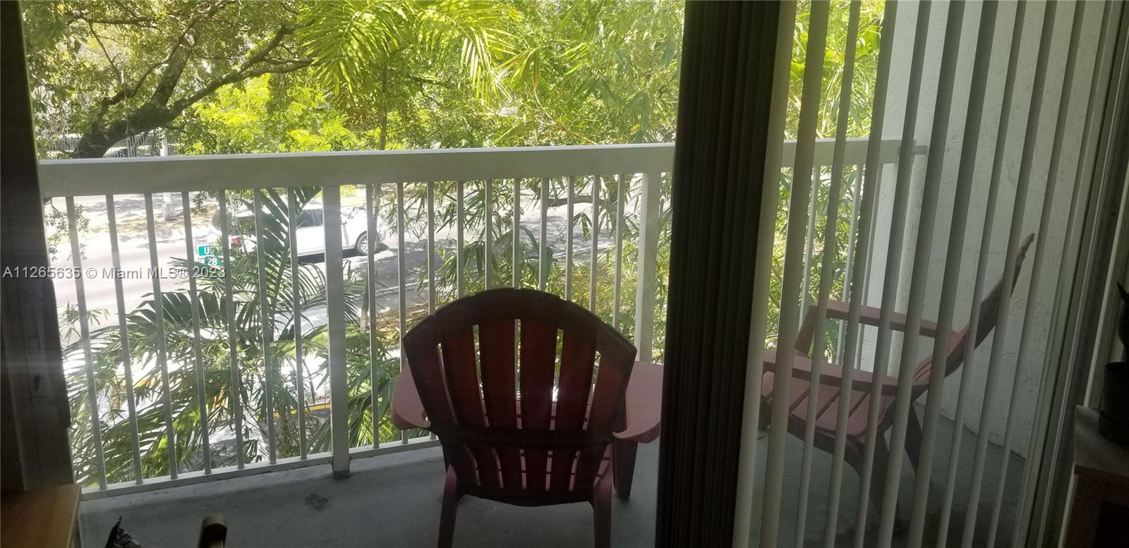 2920 Southwest 28th Terrace, Unit 304 Miami, FL 33133 - Photo 4 of 26 a view of balcony with furniture