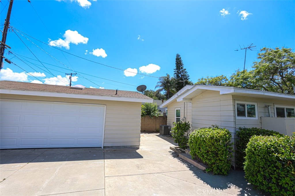 600 South Emily Street Anaheim, CA 92805 - Photo 16 of 22 a view of a house with a flower garden