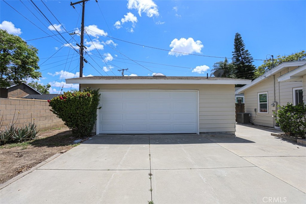 600 South Emily Street Anaheim, CA 92805 - Photo 17 of 22 a view of a house with a garage
