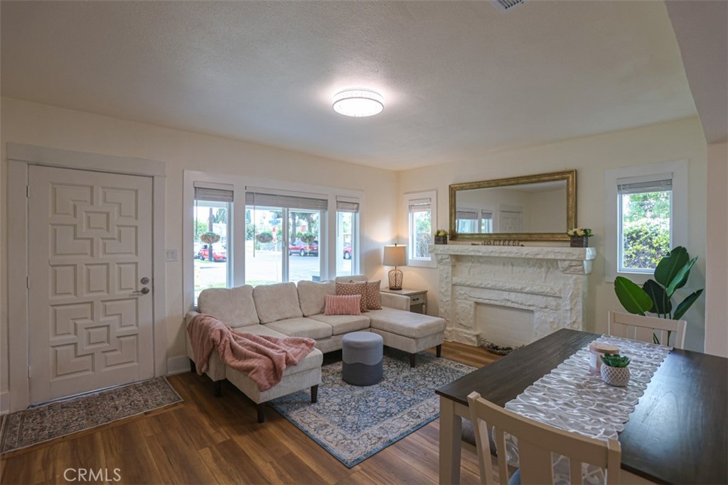 600 South Emily Street Anaheim, CA 92805 - Photo 3 of 22 a living room with furniture and a fireplace