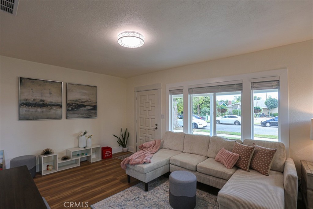 600 South Emily Street Anaheim, CA 92805 - Photo 4 of 22 a living room with furniture and a large window