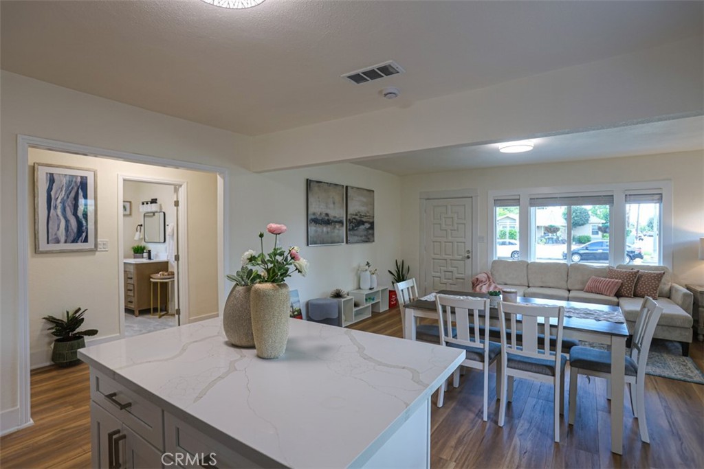 600 South Emily Street Anaheim, CA 92805 - Photo 8 of 22 a view of a dining room with furniture and wooden floor