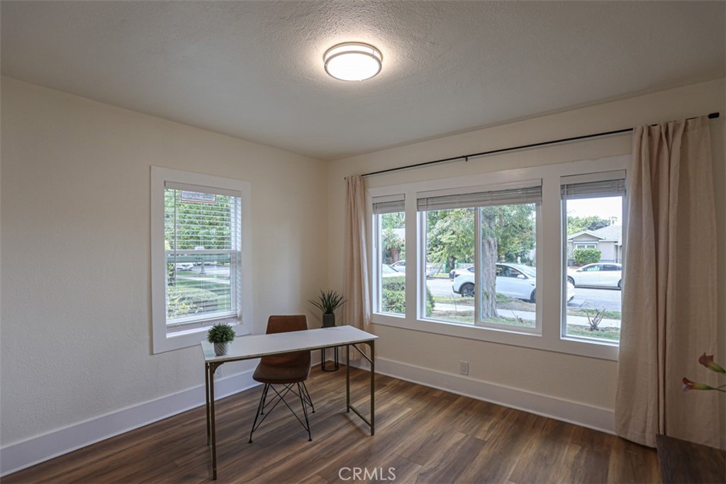 600 South Emily Street Anaheim, CA 92805 - Photo 9 of 22 a work room with wooden floor and a window