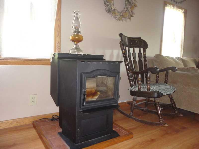 148 Swamp Run Road Butler, PA 16001 - Photo 4 of 23 Family Room. The wood burner is ample to heat the whole house and adds a homey touch to the living room.