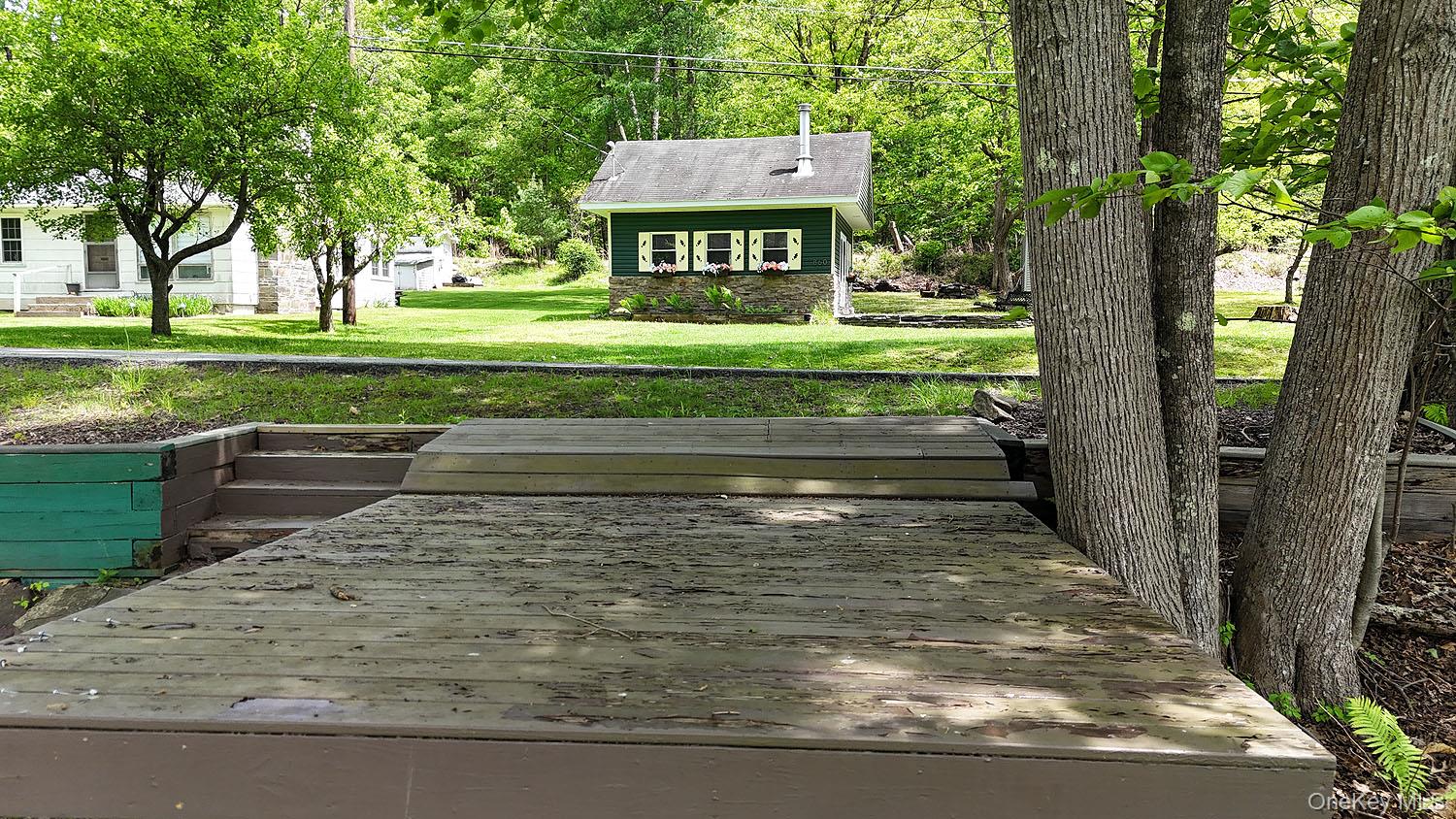 860 River Road Callicoon, NY 12723 - Photo 25 of 45 a view of a house with a yard