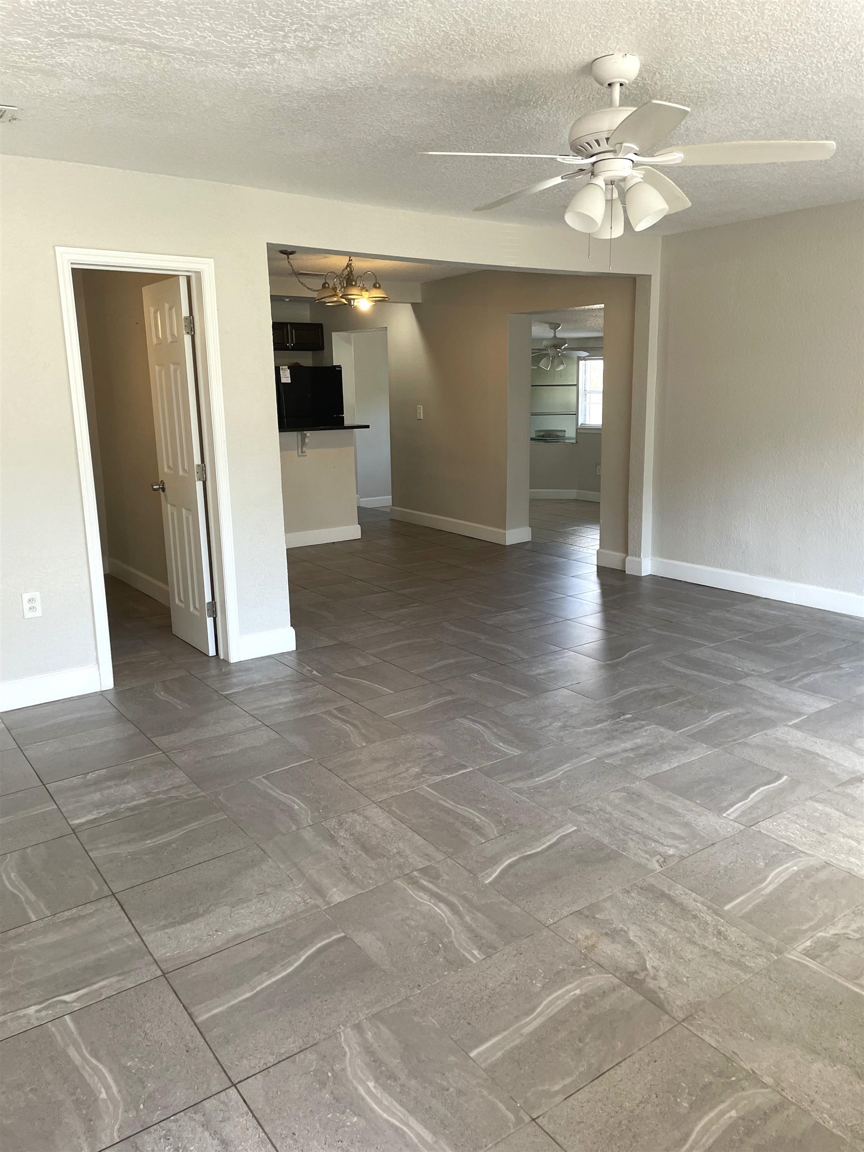 101 Flagler Boulevard, Unit A St. Augustine, FL 32080 - Photo 2 of 19 a view of a livingroom with a staircase