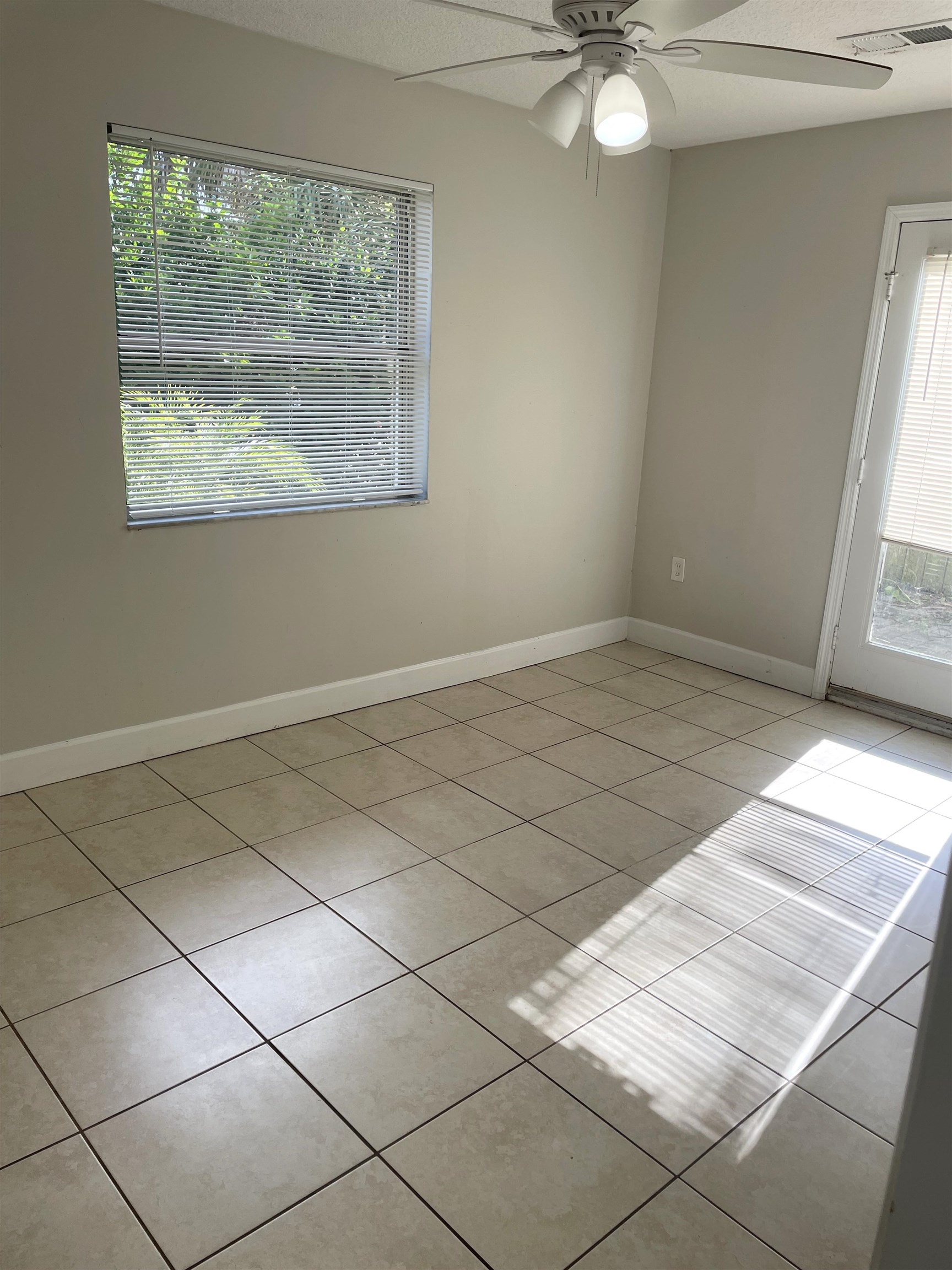 101 Flagler Boulevard, Unit A St. Augustine, FL 32080 - Photo 9 of 19 a view of an empty room with a window