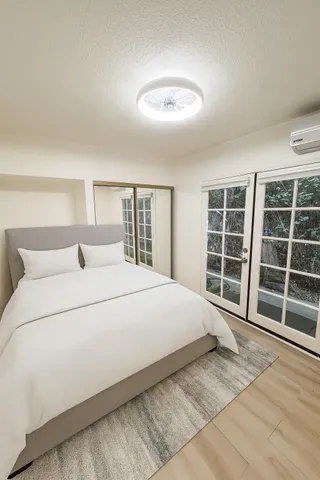 a view of bathroom with a toilet sink and a mirror