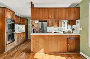 a view of a kitchen from the hallway