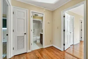 a front view of house with yard and trees