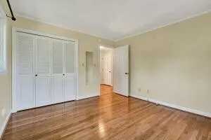 a view of a green field with lots of bushes