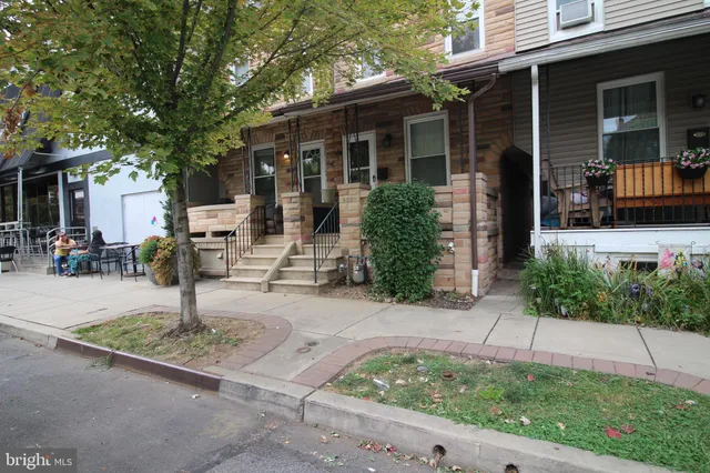 a house with yard in front of it