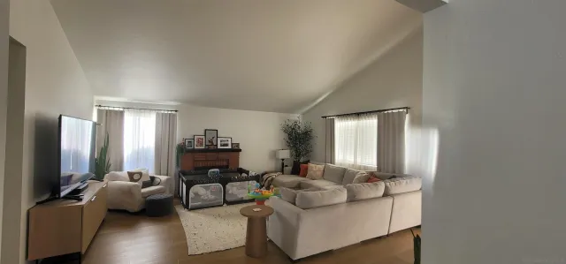 a living room with furniture and a couch