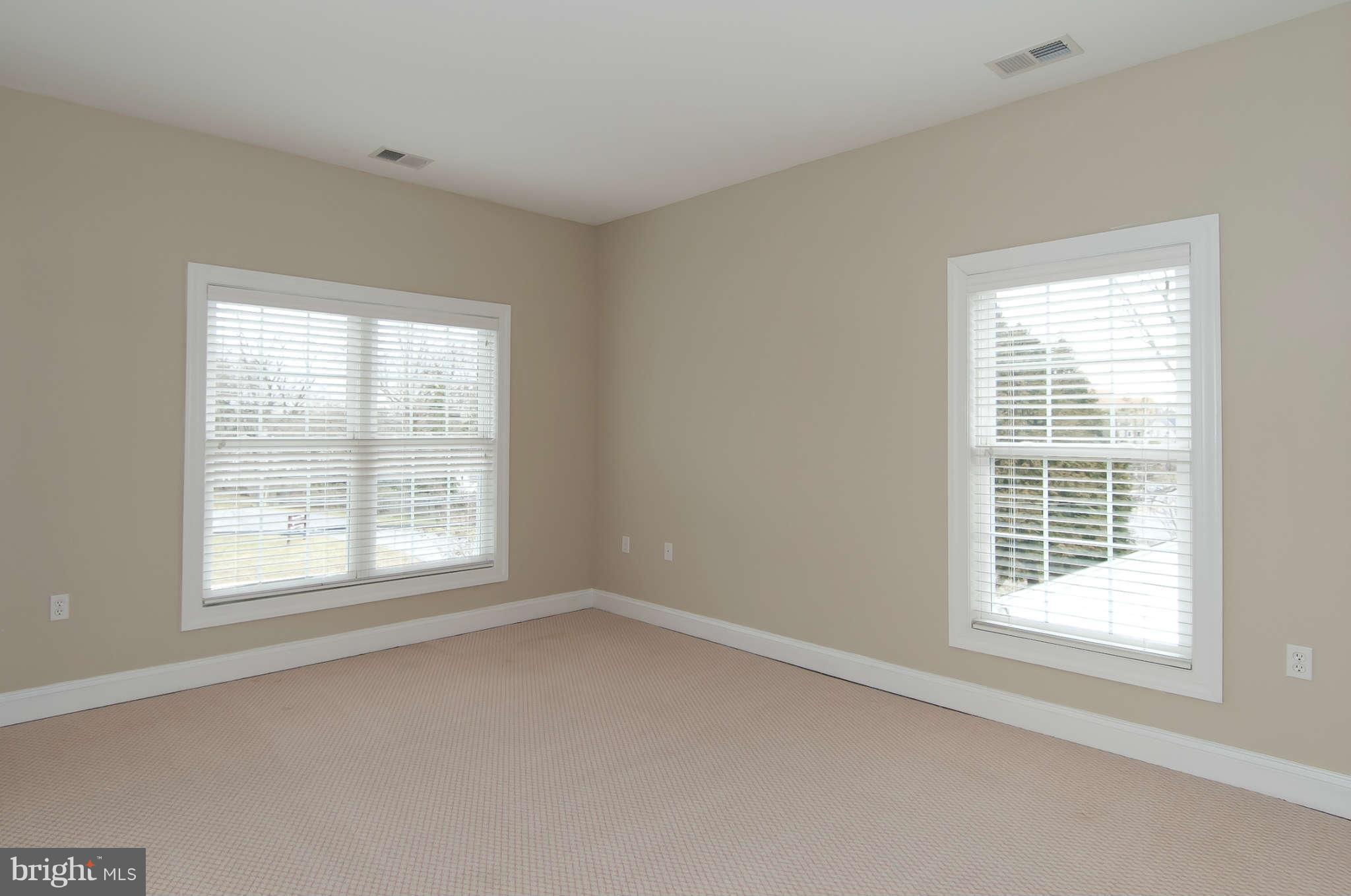 8407 Old Georgetown Road Bethesda, MD 20814 - Photo 21 of 30 an empty room with a window