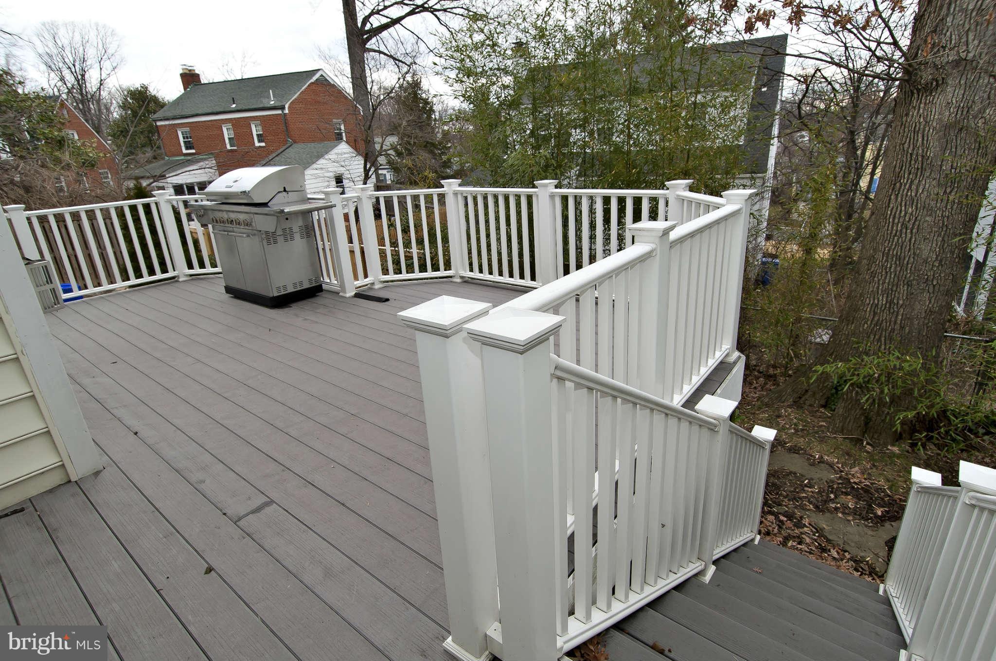 8407 Old Georgetown Road Bethesda, MD 20814 - Photo 27 of 30 a view of a wooden deck with furniture