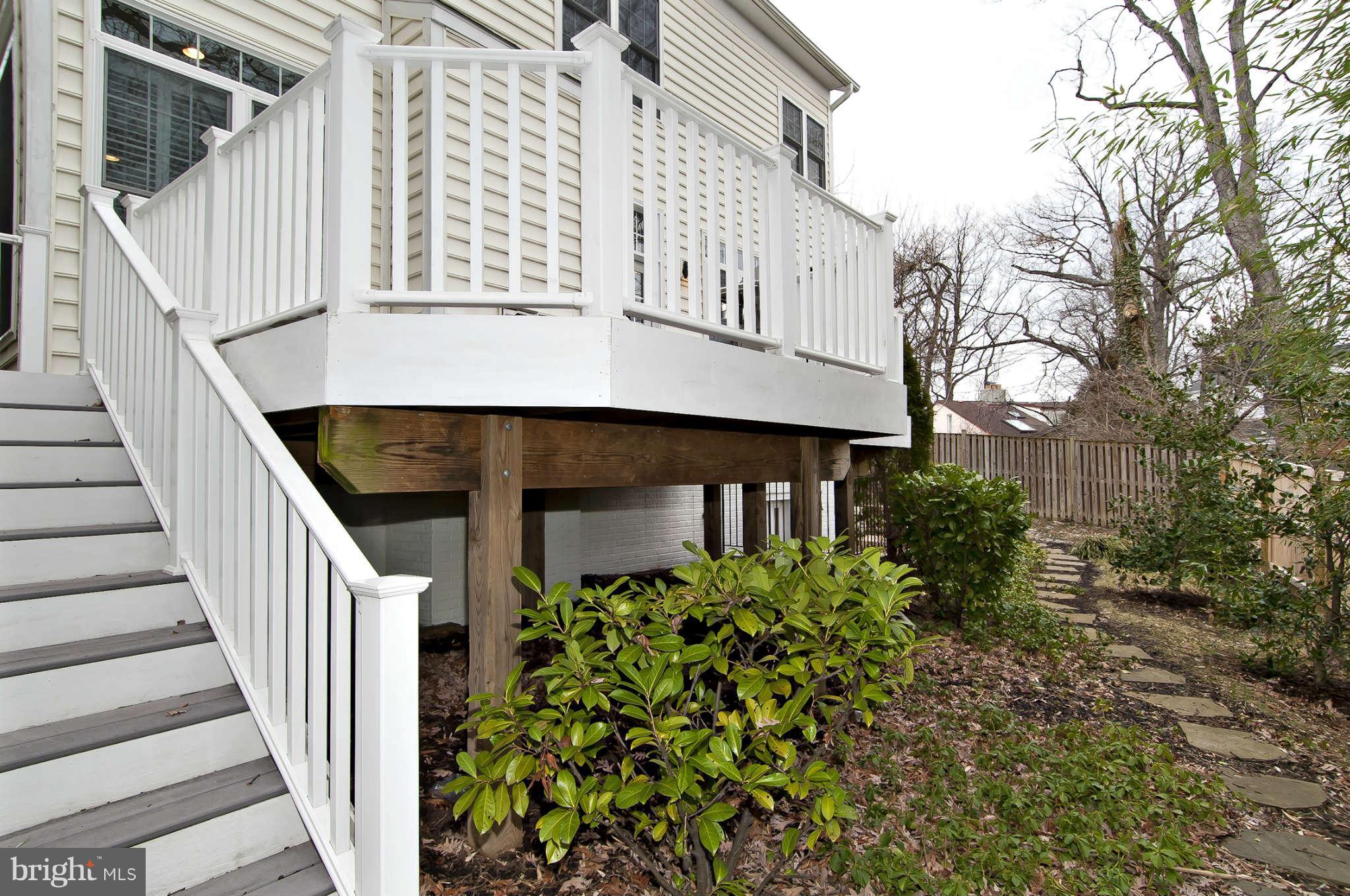 8407 Old Georgetown Road Bethesda, MD 20814 - Photo 29 of 30 front view of a house with a small yard