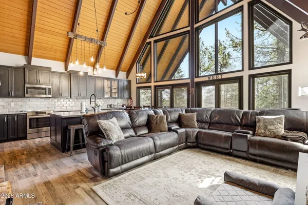 a living room with large windows