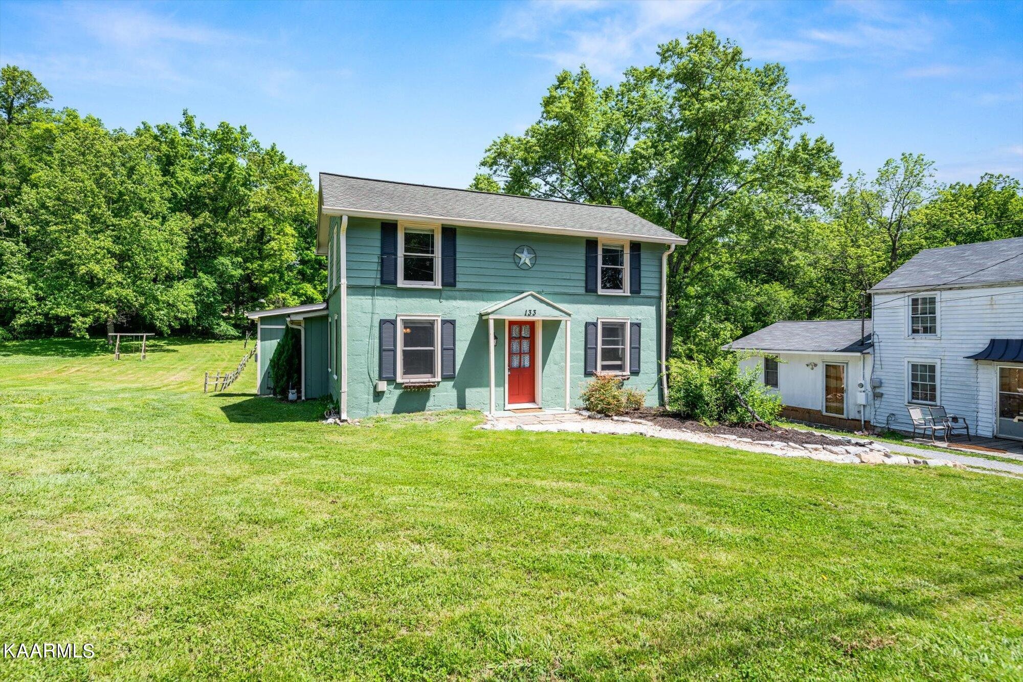 133 Oak Road Norris, TN 37828 - Photo 3 of 24 a view of a house with a yard